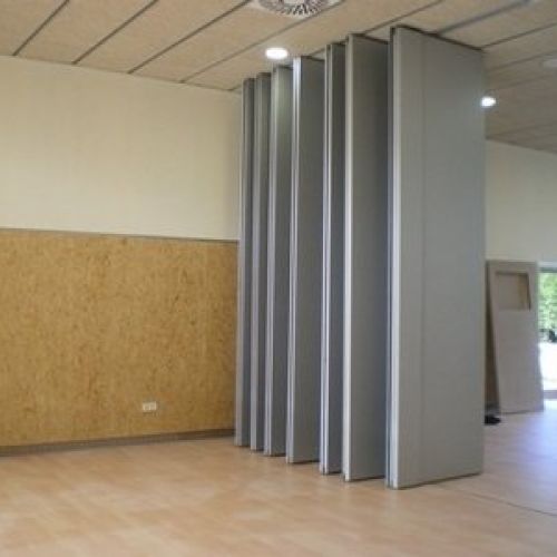 Tabique móvil monodireccional